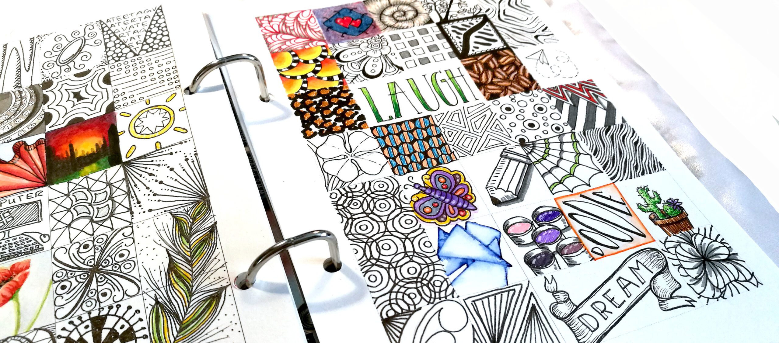 Bannerbild-Doodle Kästchen Mein neues Bannerbild, Verschiedene farbige Doodles in Kästchen gezeichnet und im Ordner abgeheftet.